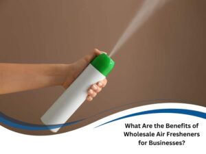 A hand sprays an aerosol can. This image promotes wholesale air fresheners benefits for businesses.