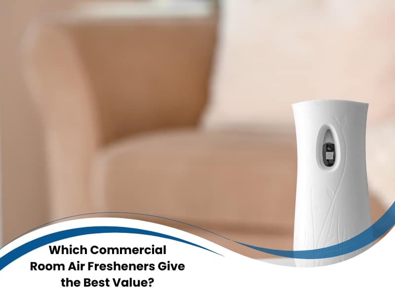 Modern office corner featuring automated Commercial Room Air Fresheners unit beside a beige chair.